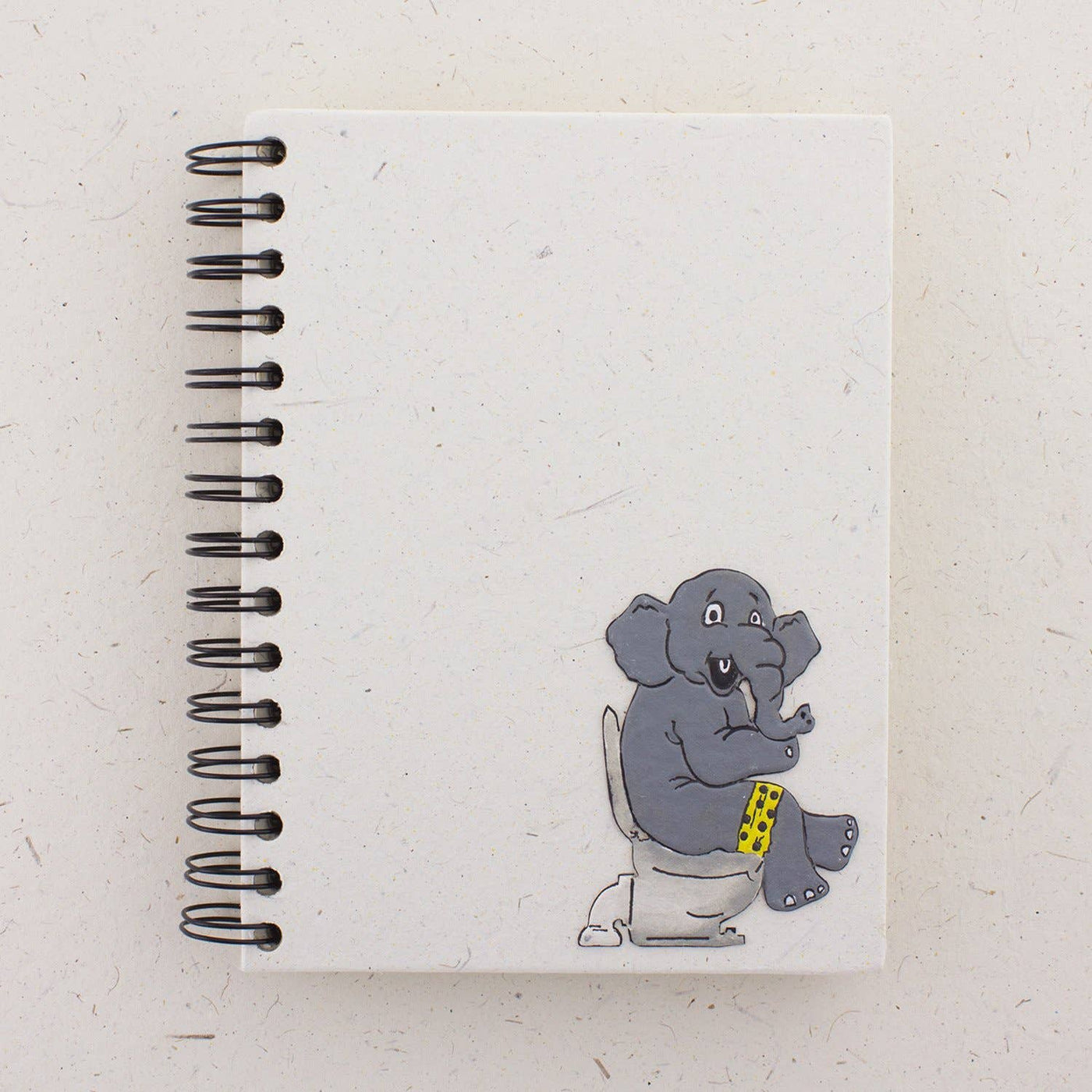 Large Notebook Elephant on Toilet
